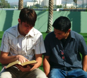guys on bench with Bible.jpg